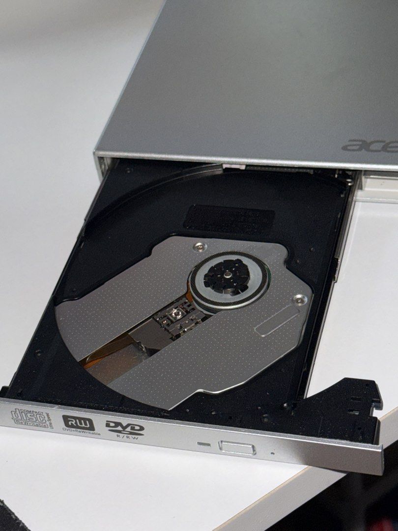 Acer External USB DVD RW Drive (Category: Hard Disks & Thumbdrives) located in Manila. Submitted by isabelaaaai (Listing ID 1454843439, Image 2). Description: still works well and in good condition. di nagamit masyado. no scratches or anything. .