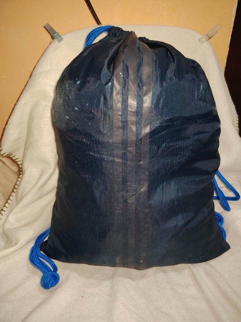 Adidas drawstring bag (Category: Backpacks) located in Taguig. Submitted by mackz13triftshop (Listing ID 1454936730, Image 2). Description: ADIDAS DRAWSTRING BAG ➡️good condi ➡️color blue and black ➡️payment first +sf ➡️magaspack para sulit sf ➡️pm for detailsover.