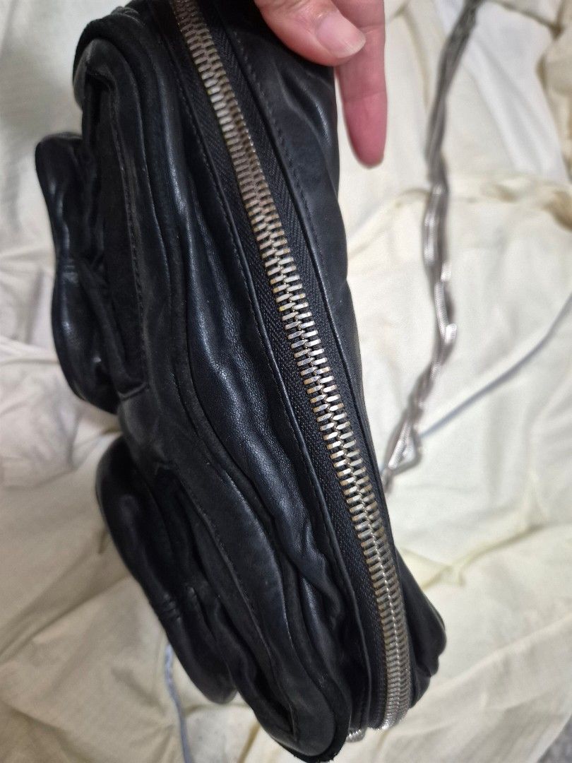 Alexander Wang Brenda multi pocket leather bag (Category: Luxury Bags & Wallets) located in Quezon City. Submitted by 53888 (Listing ID 1454919908, Image 3). Description: - Authentic Alexander Wang Brenda bag - Genuine black leather - Multi-pocket design for excellent organization - Numerous zippers and compartments - Stylish silver hardware - Chic chain strap.