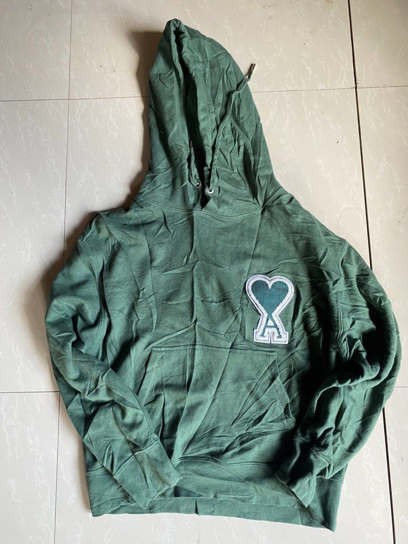 AMI Jacket (Category: Luxury Apparel) located in San Fernando. Submitted by deej_deej (Listing ID 1454890825, Image 1). Description: AMI Paris Ami de Coeur Hoodie Green Size M | Alexandre Mattiussi | Preloved.