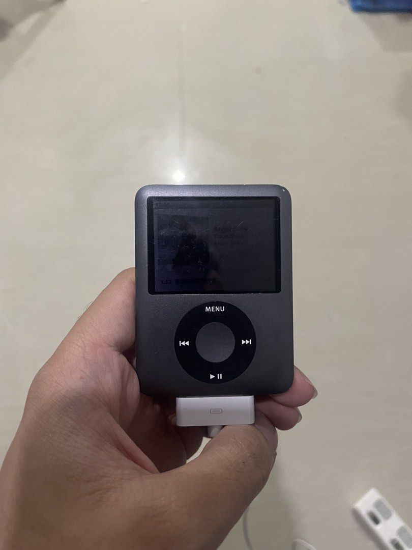 Apple iPod Nano 3rd Gen - Dark Grey (Category: Portable Music Players) located in Baguio. Submitted by beygyuu (Listing ID 1454838416, Image 2). Description: - Apple iPod Nano 7th Generation - Color: Dark Grey - Screen: Bright and clear - Click Wheel: Responsive - Ideal for portable music - Includes charging cable -death batt.