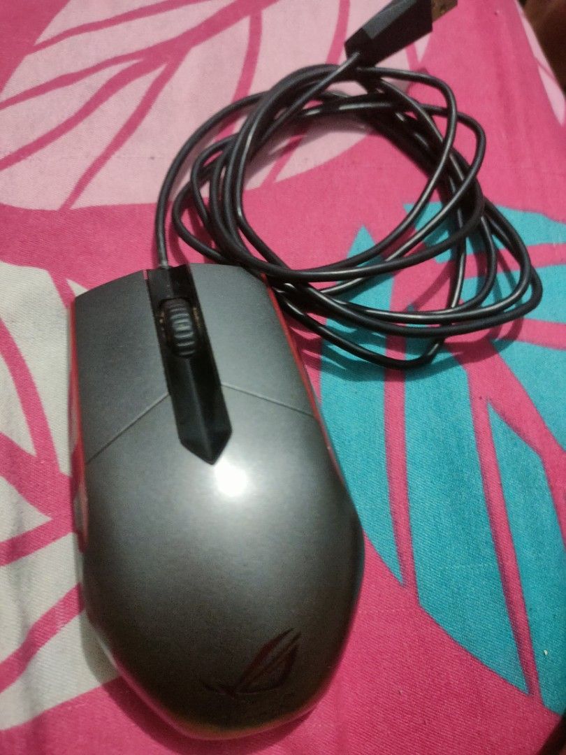 ASUS ROG Sica Optical Gaming Mouse (Category: Mouse & Mousepads) located in Caloocan City. Submitted by jjunsucayre (Listing ID 1454759859, Image 2). Description: - ASUS ROG Sica Optical Gaming Mouse - Wired USB connection - Color: Black with Red accents - Ideal for gaming - Fully functional and ready for a new owner.