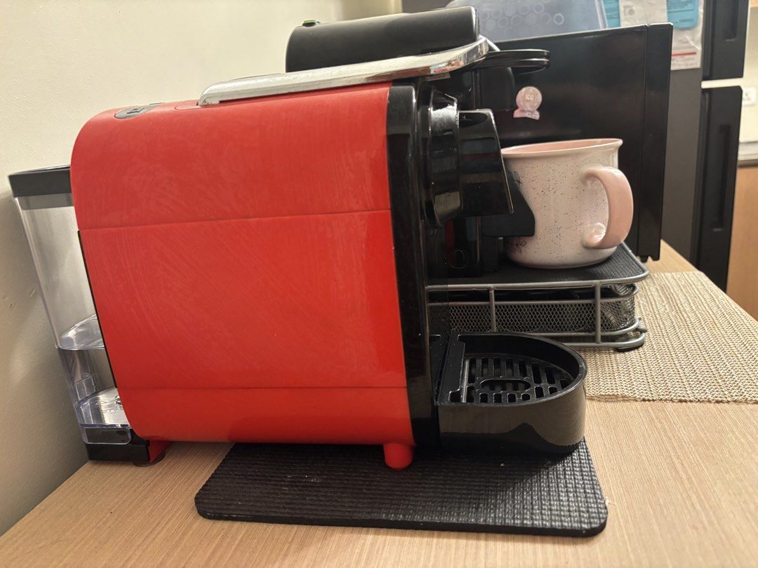 B Coffee Machine w/ assorted pods (Category: Coffee Machines & Makers) located in Manila. Submitted by irapinkapink (Listing ID 1454791018, Image 3). Description: B Coffee Machine Color: Black and red Inclusions: 60 assorted pods/capsules RFS: Upgraded to Nespresso Shipping c/o buyer.