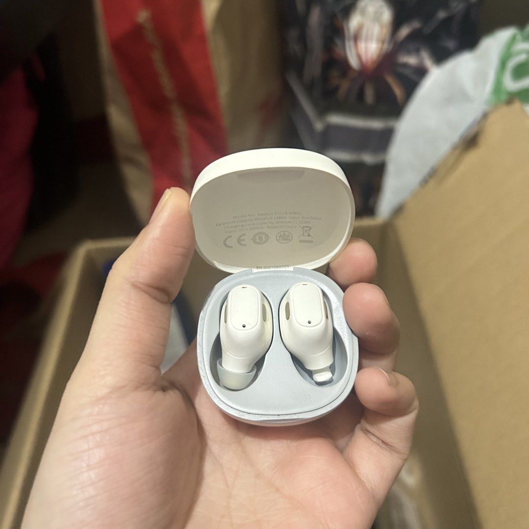 Baseus Bowie WM01 White Wireless CHARGING CASE (Category: Earphones) located in San Fernando. Submitted by gothclaudiaa (Listing ID 1454915668, Image 1). Description: Both earphone di na po gumagana. Charging case is functional pa..