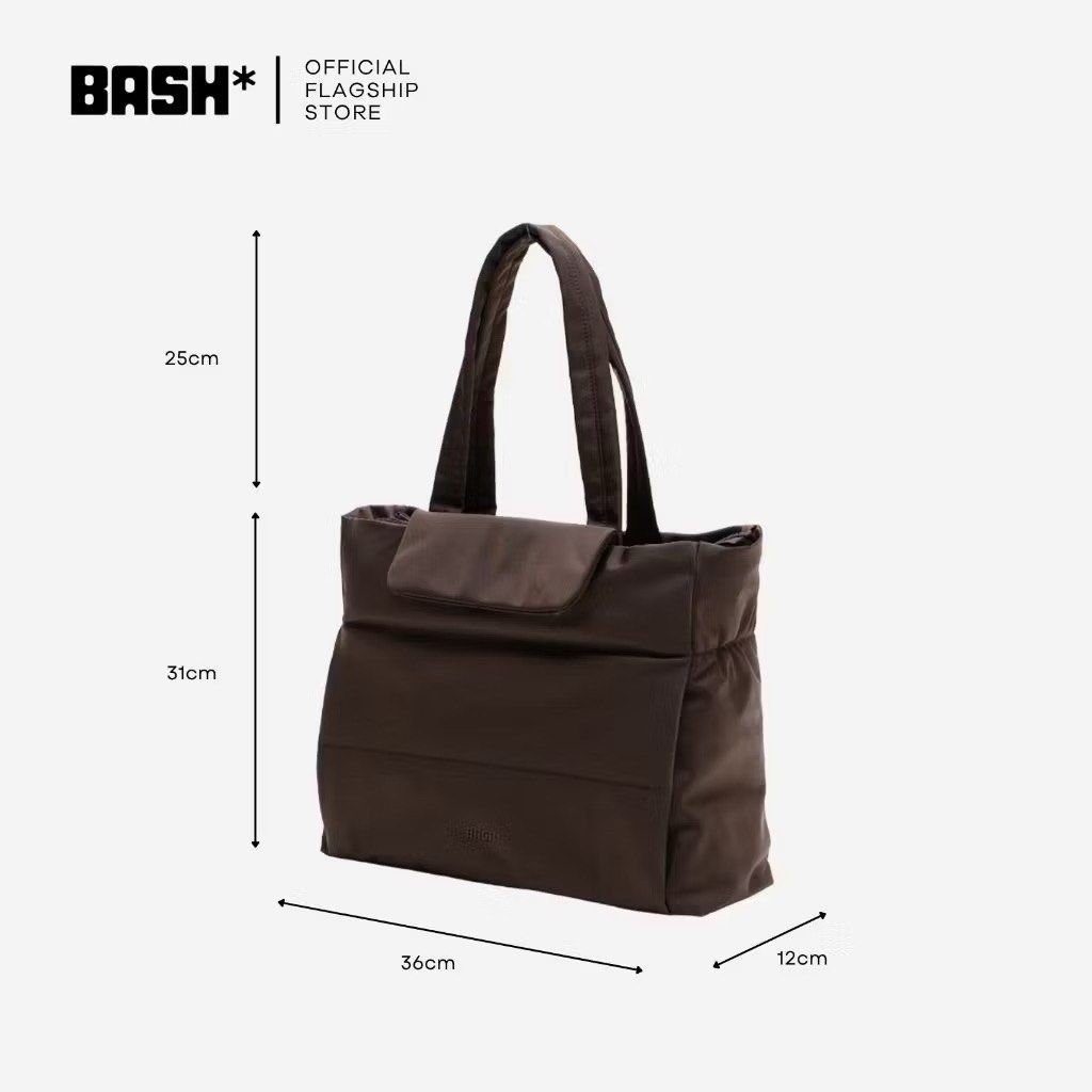 BASH* Weekday Tote Bag - Water-Resistant Nylon (Category: Tote Bags) located in Manila. Submitted by scshellfinds (Listing ID 1454950095, Image 3). Description: - BASH* Weekday Tote: The ultimate everyday bag. - Effortless travel: Slips over suitcase handles. - Stay organized: Quick-grab phone pocket and internal key strap. - Smart compartments for easy access. - Durable & water-resistant nylon material. - Dimensions: 36cm (L) x 12cm (W) x 31cm (
