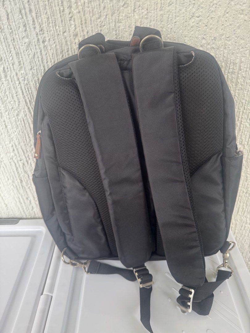 Bebear Black Diaper Bag (Category: Diaper Bags & Wetbags) located in Makati City. Submitted by rarebs (Listing ID 1454782500, Image 2). Description: - Brand new with tag but the leather part had slightly cracked/peeled due to storage. - Black Bebear backpack - Multiple pockets for excellent organization - Padded straps for comfortable carrying - Faux leather trim on handle shows some wear - Perfect for everyday use or travel.