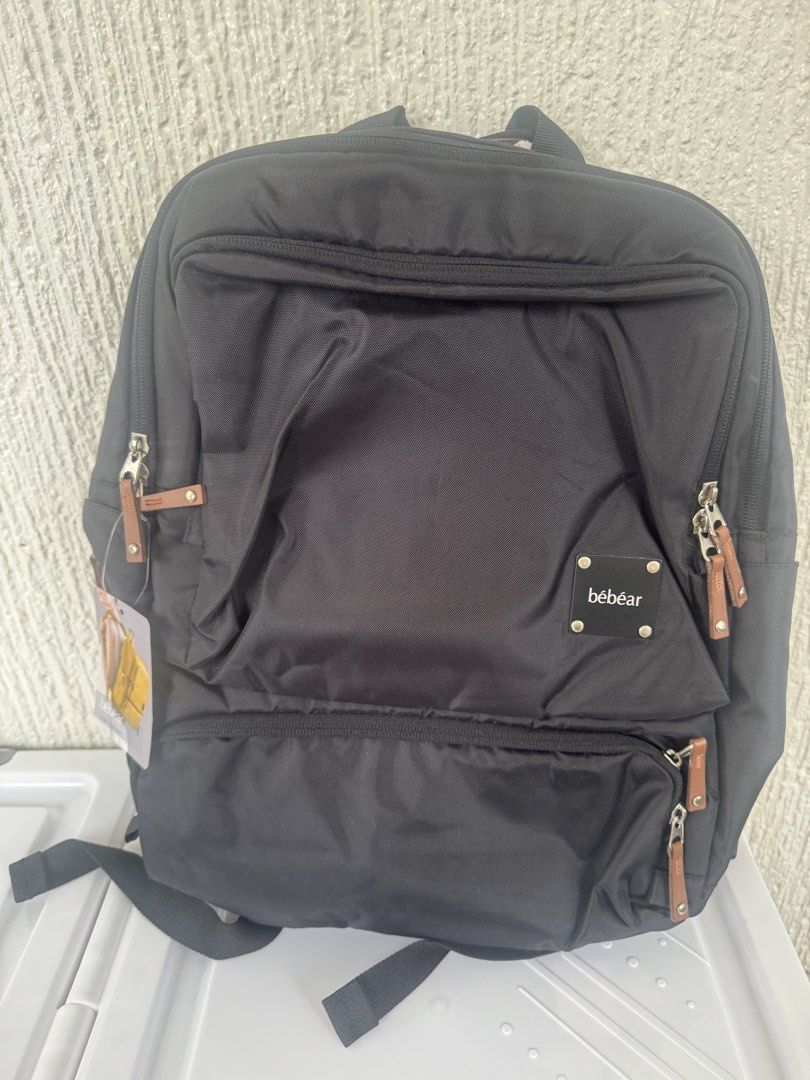 Bebear Black Diaper Bag (Category: Diaper Bags & Wetbags) located in Makati City. Submitted by rarebs (Listing ID 1454782500, Image 1). Description: - Brand new with tag but the leather part had slightly cracked/peeled due to storage. - Black Bebear backpack - Multiple pockets for excellent organization - Padded straps for comfortable carrying - Faux leather trim on handle shows some wear - Perfect for everyday use or travel.