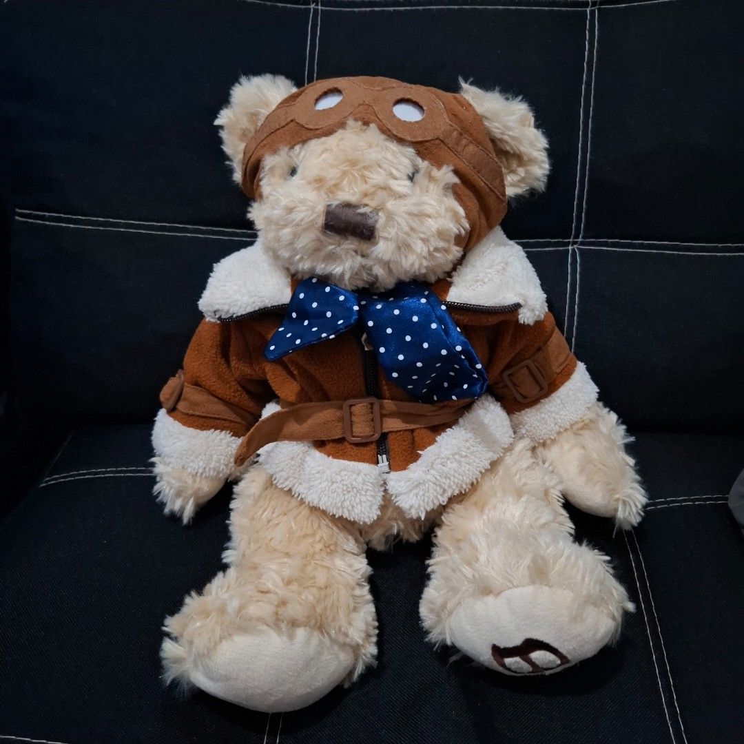 Bentley Heritage Exclusive Racing Bear (Category: Plushies & Soft Toys) located in Baliuag. Submitted by ahgashop. (Listing ID 1454848885, Image 1). Description: – Limited edition Heritage teddy bear – Inspired by iconic racing driver Sir Tim Birkin – With blue and white spotted silk neck scarf – Features a fleece jacket with suedette helmet and goggles - around 15 inches.
