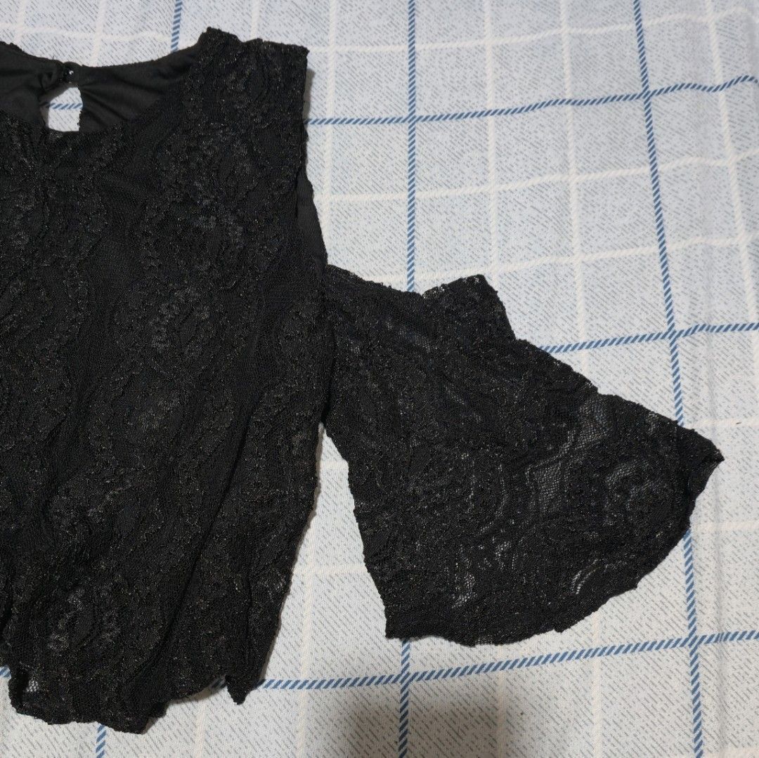 Black Lace Cold Shoulder Bell Sleeve Top (Category: Blouses) located in Las Pinas. Submitted by monmonish (Listing ID 1454764598, Image 3). Description: Best fits S-M frames Bust 36" Length 16" *Actual color may vary due to lighting *Allow 1-2cm discrepancy due to manual measurement.