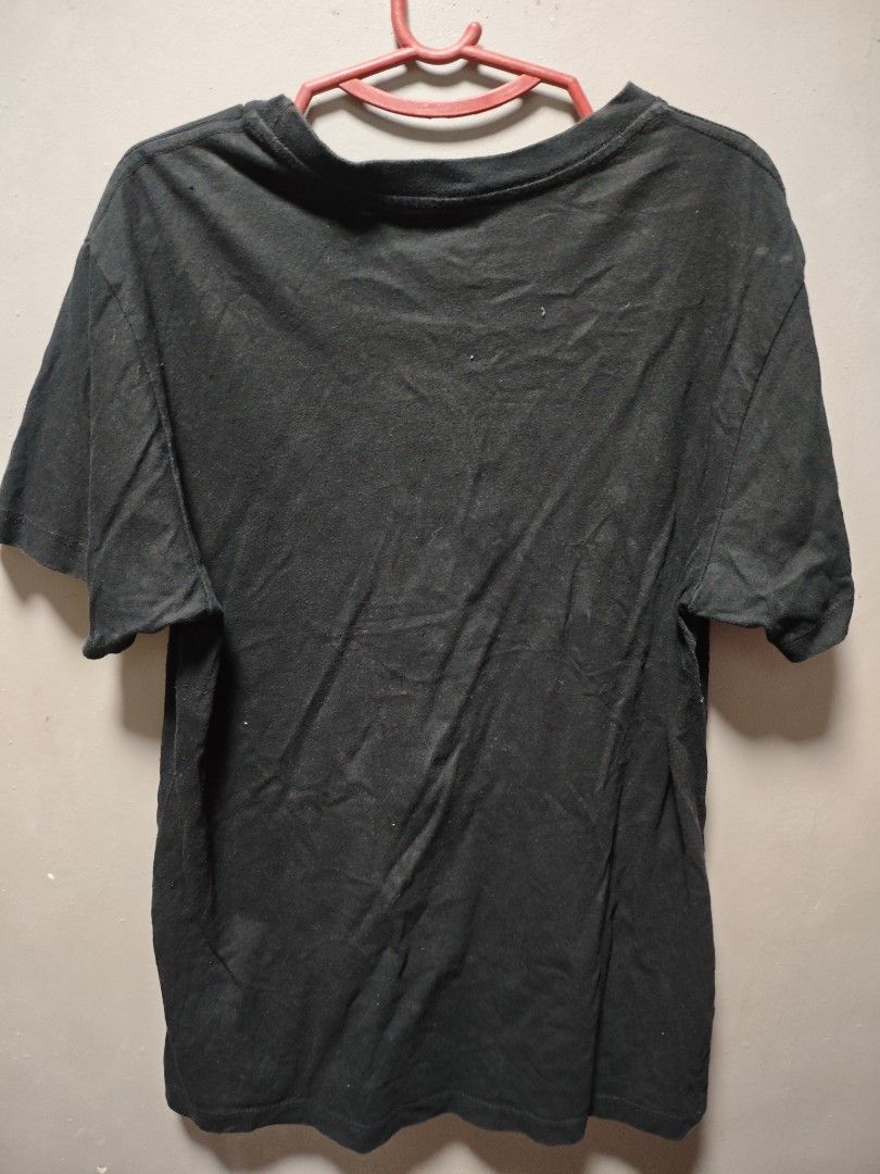 Blondie Debbie Harry T-shirt (Category: Shirts) located in Daraga. Submitted by paw.m (Listing ID 1454845994, Image 2). Description: - Black t-shirt - Graphic print of Debbie Harry from Blondie - 'BLONDIE' band name in neon-style lettering above image - Plain black back - Ideal for Blondie fans.