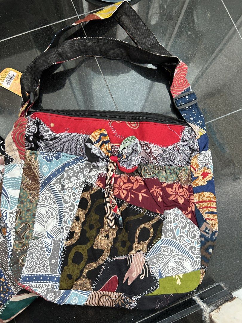 Boho Batik Patchwork Shoulder Bag (Category: Shoulder Bags) located in Singapore. Submitted by authentique531 (Listing ID 1454841672, Image 3). Description: - Unique batik patchwork shoulder bags - Each bag features a distinct pattern - Secure top zipper closure - Comfortable strap for easy carrying - Ideal for everyday use or travel - Adds a vibrant touch to any outfit $12 each or make me an offer .