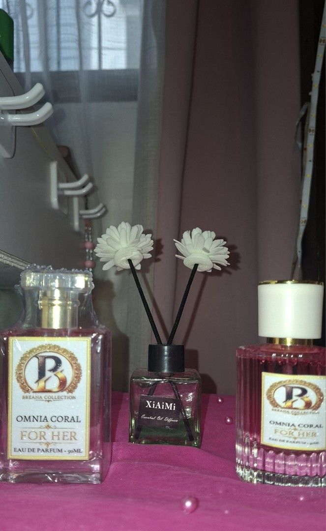 Breana Collection Omnia Coral For Her Eau de Parfum & Diffuser (Category: Fragrance & Deodorants) located in Manila. Submitted by brutalnaiffur (Listing ID 1454785584, Image 1). Description: - Breana Collection Omnia Coral For Her Eau de Parfum (50ml) - Both items feature a delightful pink/coral scent - Ideal for personal enjoyment or as a thoughtful gift - Items are good and new.