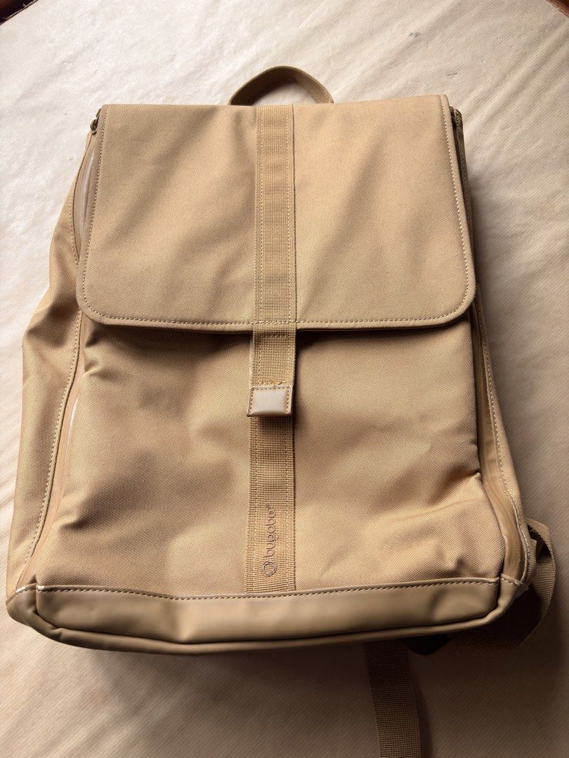 Bugaboo Backpack Baby Bag (Category: Changing Mats & Accessories) located in Quezon City. Submitted by balongstoylounge (Listing ID 1454850204, Image 2). Description: - Bugaboo baby bag backpack in stylish camel color. - Secure flap velcro closure. - Interior features a zippered mesh pocket, laptop compartment, bottle holder. - Easy open zipper to easily get items. - Includes an additional smaller mesh pouch and insulated pouch. - Bottle water or