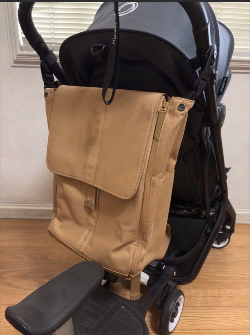 Bugaboo Backpack Baby Bag (Category: Changing Mats & Accessories) located in Quezon City. Submitted by balongstoylounge (Listing ID 1454850204, Image 1). Description: - Bugaboo baby bag backpack in stylish camel color. - Secure flap velcro closure. - Interior features a zippered mesh pocket, laptop compartment, bottle holder. - Easy open zipper to easily get items. - Includes an additional smaller mesh pouch and insulated pouch. - Bottle water or