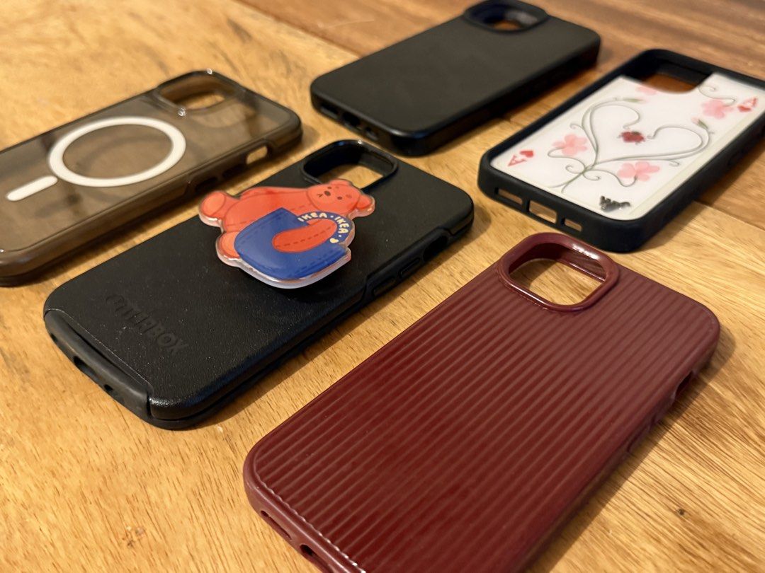 Bundle - iPhone 13 Cases | Otterbox, Wildflower Dupe, etc. (Category: Cases & Sleeves) located in Quezon City. Submitted by reesellah (Listing ID 1454833889, Image 3). Description: • rfs: upgraded • OG Otterbox (bottom left and middle), Wildflower Dupe (upper right), etc. • loc: tandang sora, QC • shipping c/o buyer.
