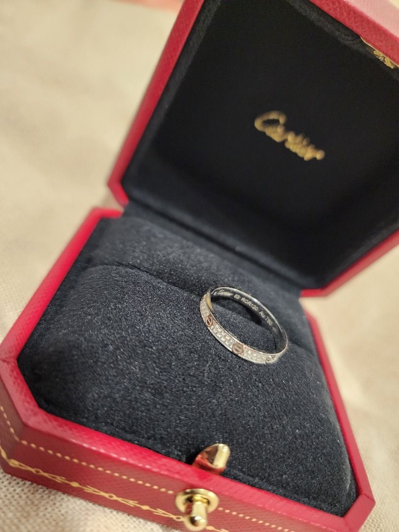 Cartier Love Ring 18K Gold Diamonds (Category: Rings) located in Cordon. Submitted by jrluxurs (Listing ID 1454948854, Image 3). Description: - Authentic Cartier Love Ring - Narrow band model - Set with diamonds - Crafted in 18K rose gold and white gold - Comes with original Cartier box - Ideal for stacking or wearing as a standalone piece.