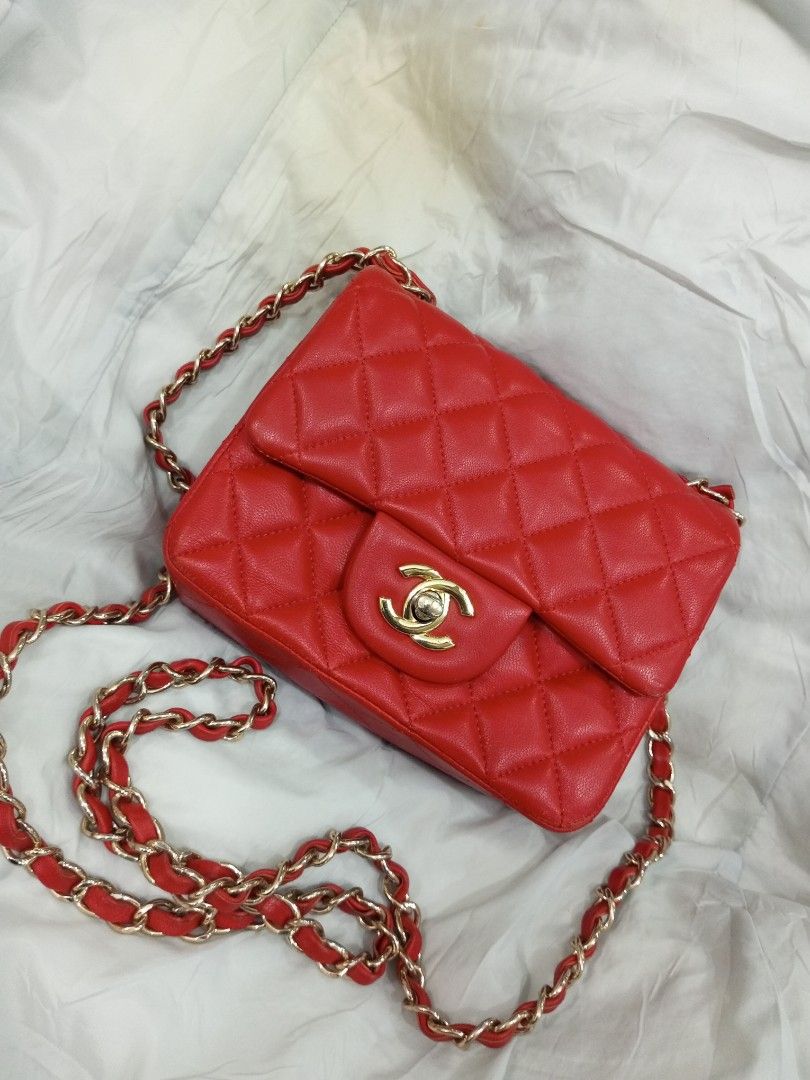 Chanel Red Quilted Lambskin Classic Flap Bag (Category: Luxury Bags & Wallets) located in Bacolod City. Submitted by exequelgra46775 (Listing ID 1454921956, Image 1). Description: - Classic Chanel flap bag in bright red - Genuine lambskin leather with signature quilting - Elegant gold chain strap - Iconic CC turn-lock closure - Interior 'Chanel Made in France' stamp - Authenticity sticker included - A perfect statement accessory.