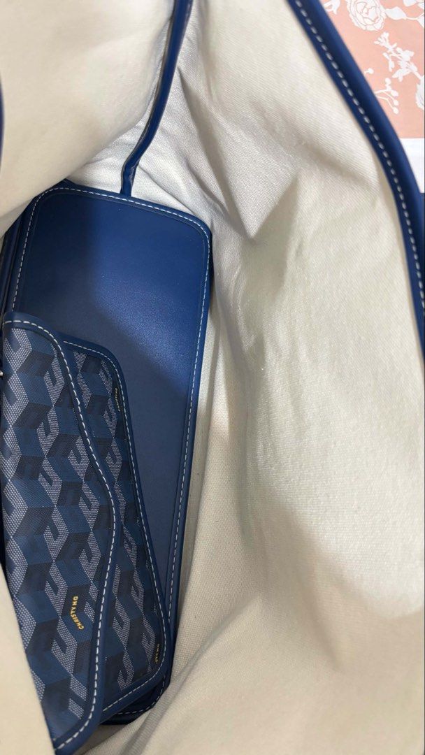Christy Ng Navy Monogram Tote Bag with Pouch (Category: Tote Bags) located in Binan City. Submitted by franchescalavina (Listing ID 1454903072, Image 3). Description: - Navy blue Christy Ng tote bag (dupe) - Features signature monogram pattern - Comes with a matching smaller pouch inside - Interior is lined with canvas - Small mark inside the bag (shown in the last photo) - Great for everyday use.