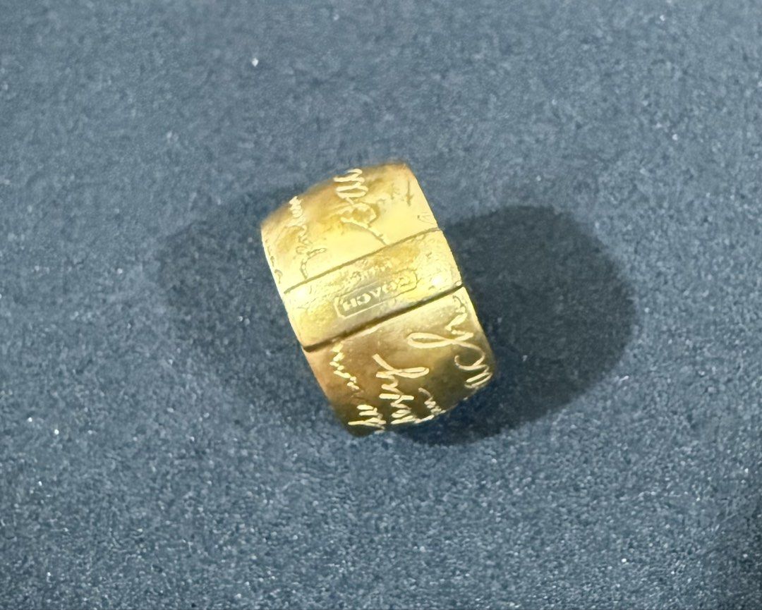Coach Ring (Category: Rings) located in Singapore. Submitted by i.leen (Listing ID 1454848044, Image 1). Description: Well used and kept in storage. It’s tarnished especially at the bottom of the shank. Due to this, it looks vintage. 😁 Pictures do not reflect exact color. It’s not as “yellow” in reality. Pls chat only if you’re comfortable with it. Tks .
