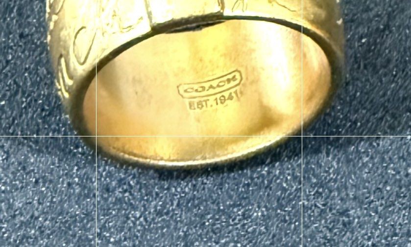 Coach Ring (Category: Rings) located in Singapore. Submitted by candidcurator (Listing ID 1454848044, Image 4). Description: Well used and kept in storage. It’s tarnished especially at the bottom of the shank. Due to this, it looks vintage. 😁 Pictures do not reflect exact color. It’s not as “yellow” in reality. Pls chat only if you’re comfortable with it. Tks .