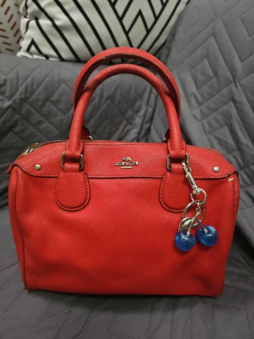 Coach Rowan Satchel in Red (handbag) (Category: Shoulder Bags) located in Manila. Submitted by shopaholicmimi (Listing ID 1454938237, Image 1). Description: ✨ PRODUCT DETAILS: - Brand: COACH - Model: Rowan Satchel - Material: Durable crossgrain leather with fabric lining - Hardware: Silver-tone - Dimensions: 10" (L) x 6.5" (H) x 5.5" (W) - Features: Top handles (4.25" drop), zip-top closure, exterior front zip pocket, interior zip & multifunction