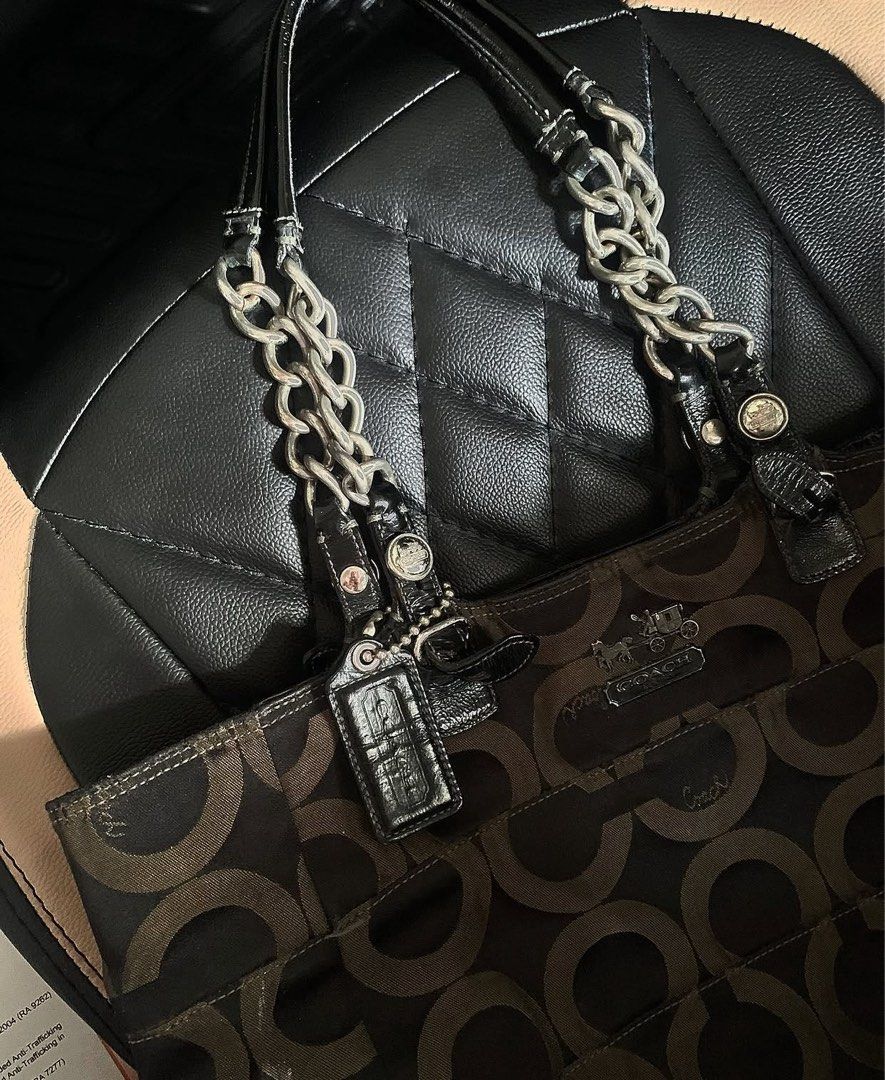 Coach Signature C Monogram Tote Bag with Chain Straps (Category: Luxury Bags & Wallets) located in Manila. Submitted by obenarioan15240 (Listing ID 1454792201, Image 3). Description: - Classic Coach tote bag - Signature brown and tan C monogram pattern - Shiny black patent leather handles - Silver chain accents - Spacious interior for essentials - Ideal for everyday use or weekend getaways - Stylish and practical addition to your collection Issue