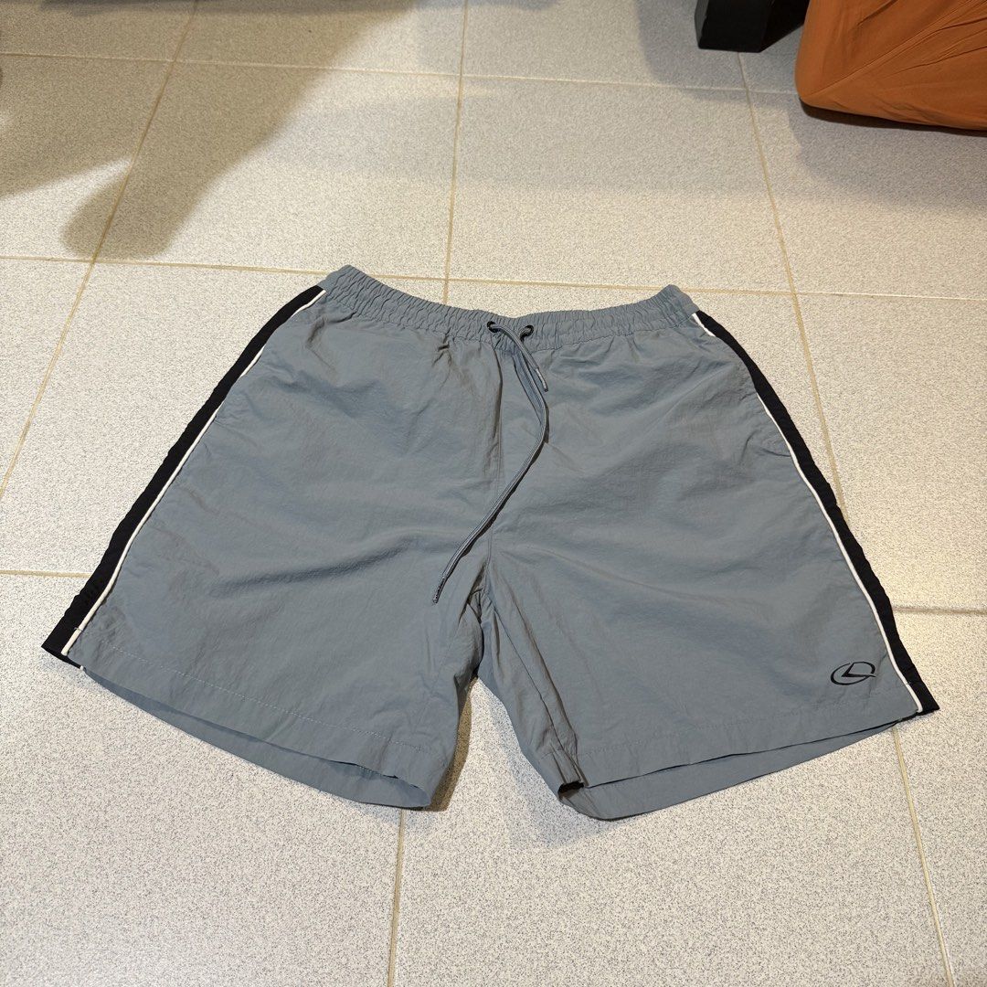 Codegraphy Nylon Shorts (Category: Shorts) located in Singapore. Submitted by friendlyneighbor_k (Listing ID 1454874832, Image 2). Description: * Lightweight and comfortable for everyday wear * Durable nylon material * Water-repellent / splash-resistant fabric * Quick-drying and easy to care for * Relaxed fit with a practical, comfortable length * Great for casual wear, travel, outdoor activities, or daily use * Simple, versatile design that’s ea