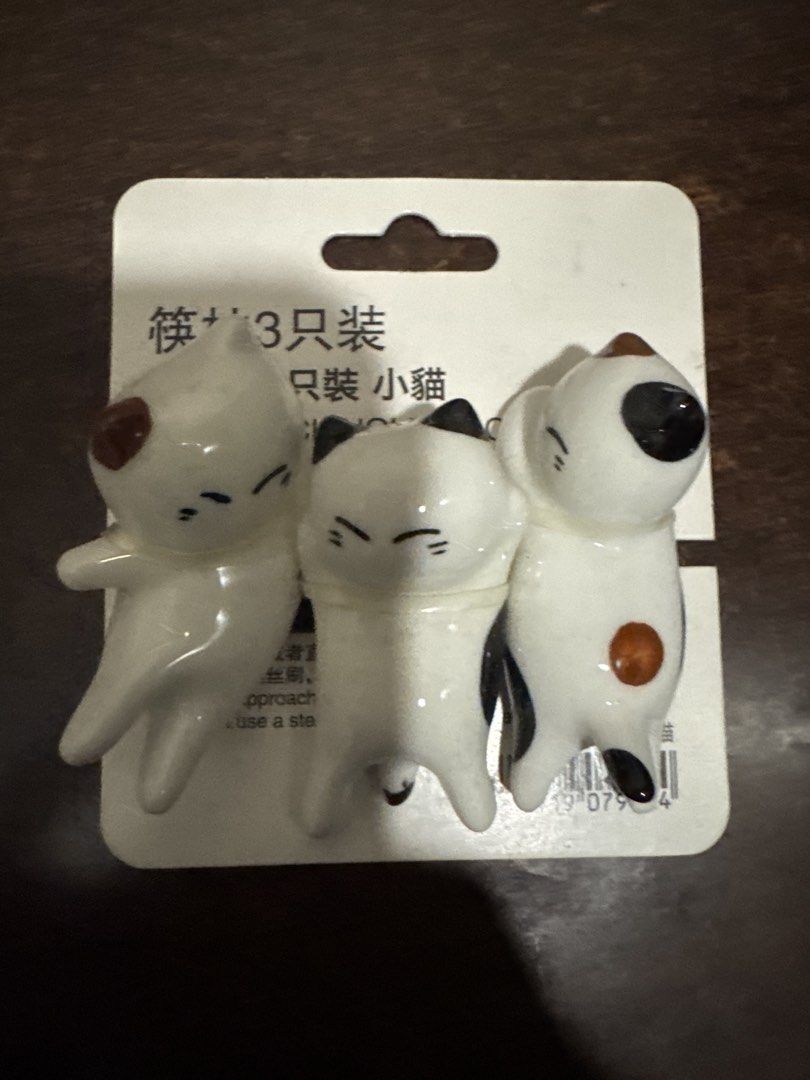 Cute Ceramic Cat Chopstick Holders Set of 3 (Category: Other Kitchenware & Tableware) located in Quezon City. Submitted by vsaint (Listing ID 1454757635, Image 1). Description: - Set of 3 adorable ceramic cat chopstick rests. - Features a beautiful, glossy finish. - Ideal for holding chopsticks, spoons, or as decorative accents. - A must-have for cat lovers and fans of cute kitchenware. - Comes in its original packaging..