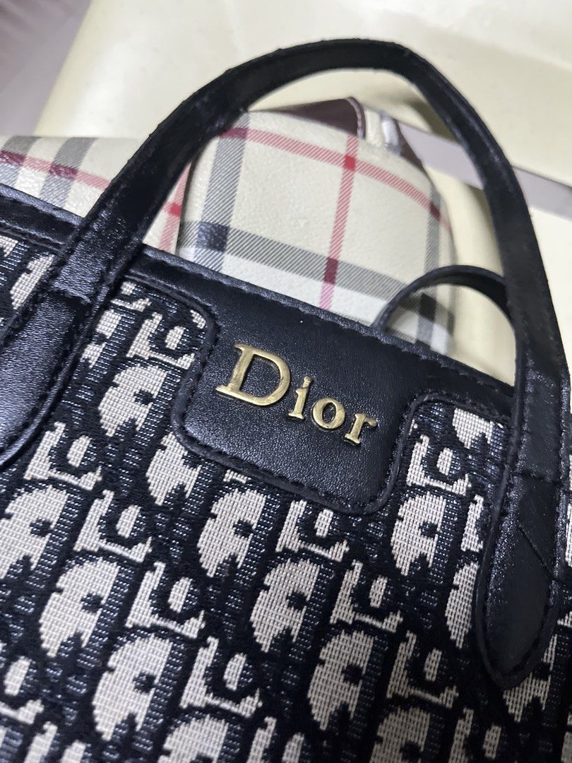 Dior Monogram Canvas Leather Tote Bag (Category: Luxury Bags & Wallets) located in Manila. Submitted by jj_thrift (Listing ID 1454828473, Image 3). Description: - Classic Dior tote bag - Iconic Dior monogram canvas - Black leather trim - Top handles - Zip closure - Interior leather patch with Dior logo - Serial number: SP2175 - Ideal for everyday use.