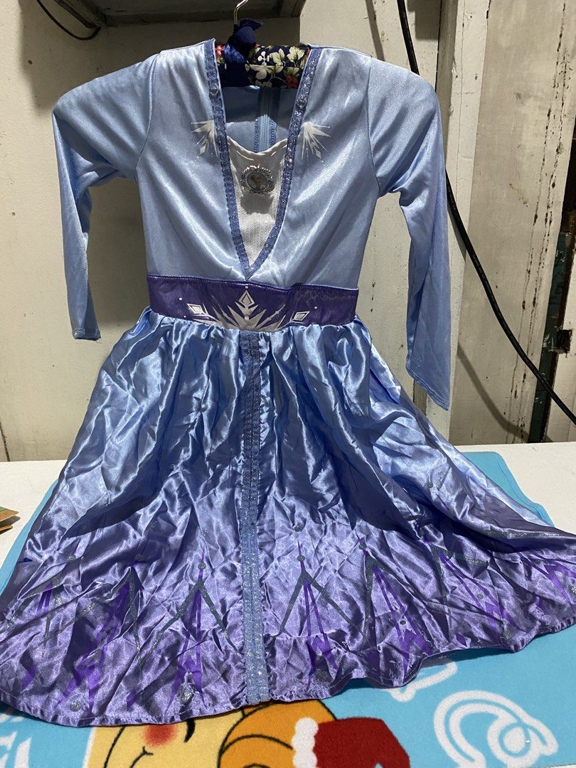 Disney Store Frozen 2 Elsa Costume (Category: Babies & Kids Fashion) located in Manila. Submitted by resi.diaz (Listing ID 1454940276, Image 1). Description: - Medium size on tag shoulders- 9 1/2 inches Waistline- 20 inches Length- 31 inches.