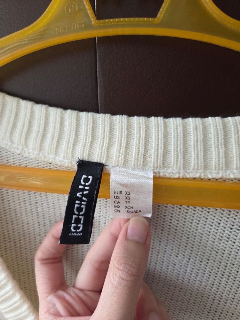 DIVIDED by H&M - Cream Knit Button-Up Cardigan (Category: Coats, Jackets and Outerwear) located in Paranaque City. Submitted by jangluvr (Listing ID 1454814050, Image 2). Description: DIVIDED by H&M - Knit Button-Up Cardigan (Cream) the item is still in good condition.