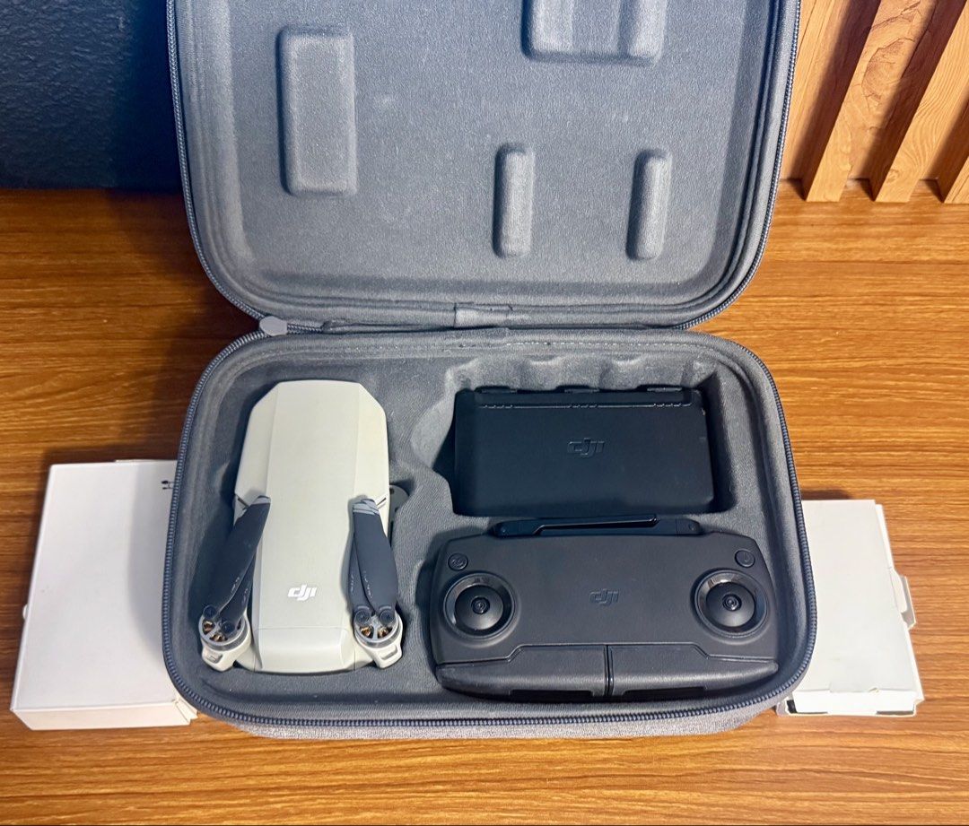 DJI MAVIC MINI (FMC) (Category: Drones) located in Manila. Submitted by mongzkee (Listing ID 1454845403, Image 2). Description: DJI MAVIC MINI FLY MORE COMBO - Drone unit - Remote Control - 3 batteries - 1 Charging Hub (3 Batt. simultaneous charging) - 3 different cords - Extra propellers - Extra controller knob - Drone case RFS - Rarely used.