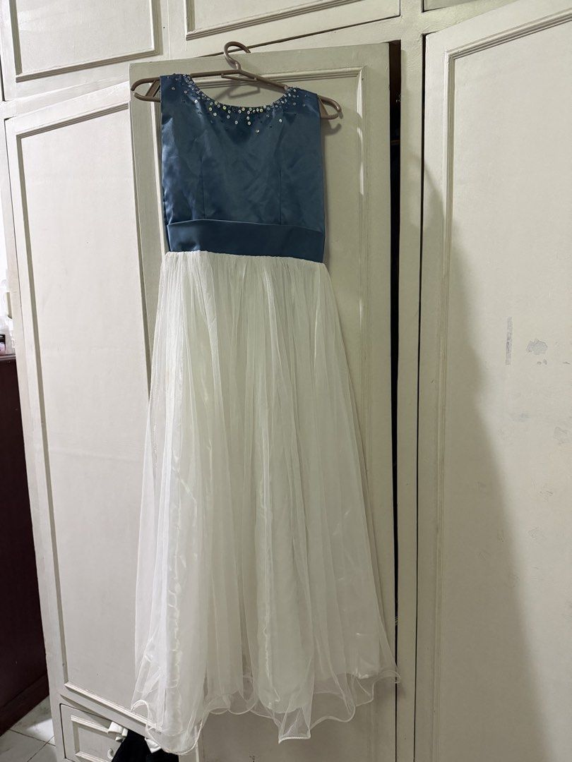 Dress for kids (Category: Babies & Kids Fashion) located in Quezon City. Submitted by cathrd (Listing ID 1454942231, Image 1). Description: Blue and white dress for 5-8yo 45” length 12.5” bust No brand - with stain 📍tandang sora, qc.