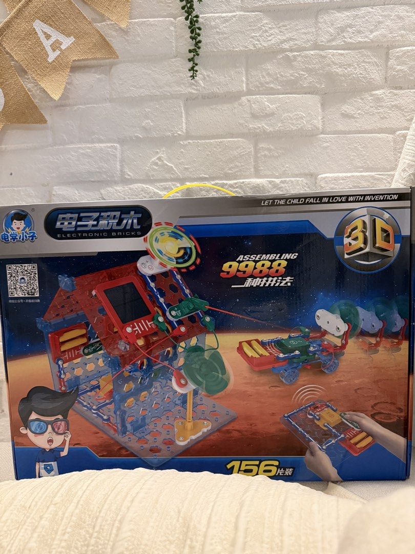 Electronic Bricks (Category: Lego & Building Sets) located in Singapore. Submitted by mommysui (Listing ID 1454913484, Image 1). Description: - Fun electronic bricks set for kids - Build various models like houses and cars - Includes 156 pieces - Encourages invention and creativity - Great for learning about circuits - Helps children fall in love with invention - similar to snap circuit Lightly used, got it at $75, willing to let go at $50 Take n