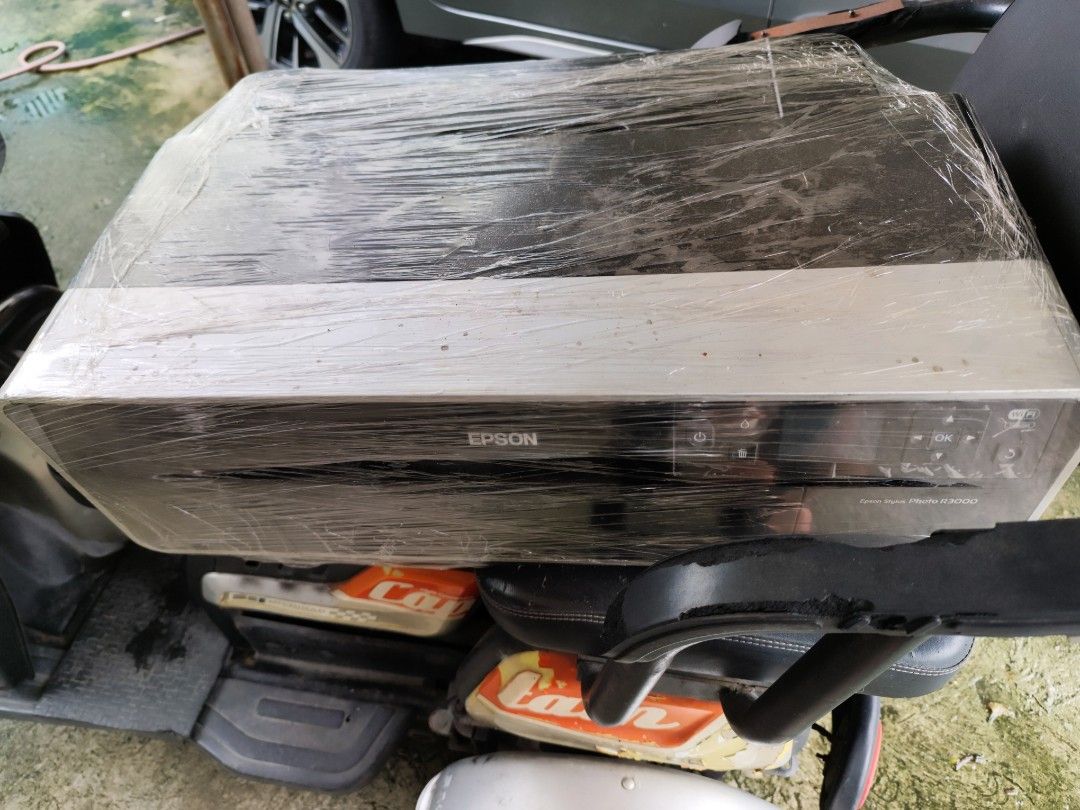 Epson Stylus Photo R3000 Printer (Category: Printers, Scanners & Copiers) located in Manila. Submitted by silentstar-0f4b (Listing ID 1454788278, Image 3). Description: - Epson Stylus Photo R3000 printer - Model: B471A - Power: 120V, 50-60Hz, 0.5A - Serial Number: J6SY007716 - Origin: Made in Indonesia - Condition: Wrapped in plastic - needs repair fuse daw po sira.