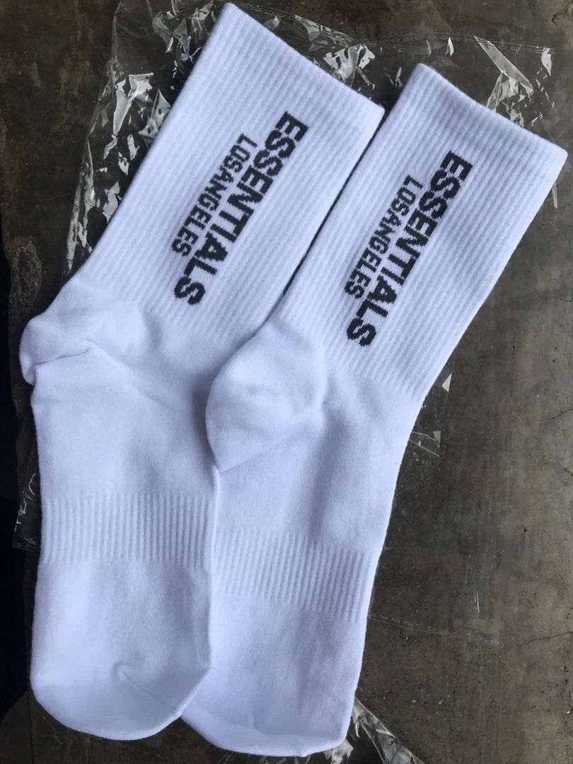 Essentials Los Angeles White Socks (Category: Socks) located in Manila. Submitted by deguertoje73072 (Listing ID 1454810638, Image 1). Description: - Essentials Los Angeles white socks - Crew length - Comfortable for everyday wear - Perfect for sports or casual outfits - Get a pair today!.