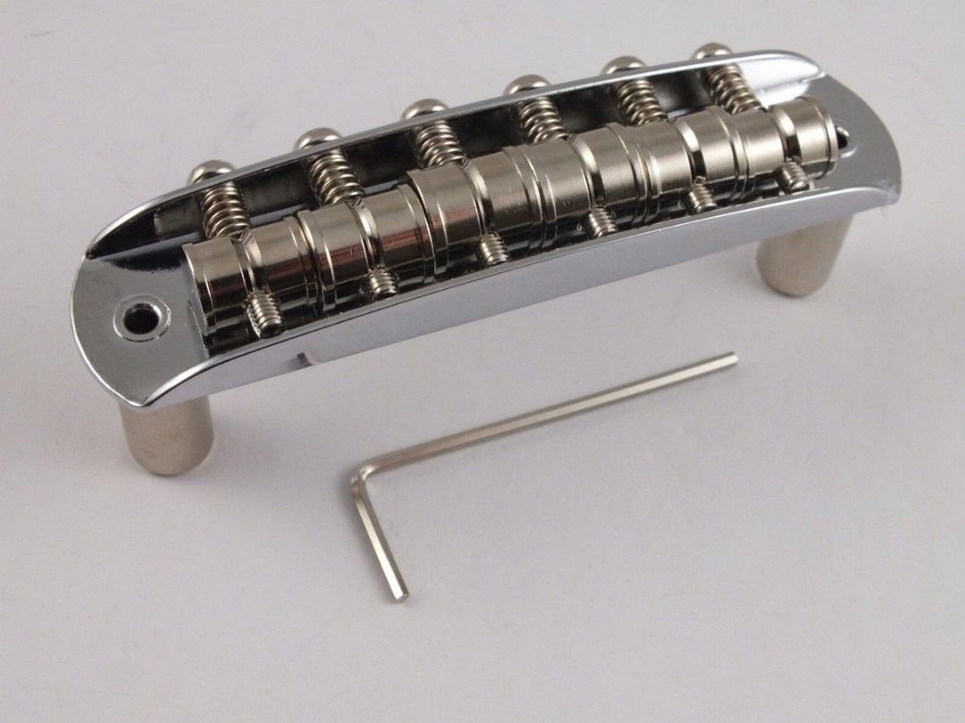 Fender Offset bridge + Tom conversion thimbles (Category: Musical Instruments) located in Kuching. Submitted by michealhardcore115 (Listing ID 1454876829, Image 3). Description: A TOM Mustang bridge conversion set Mustang offset bridge in 9.5 inch radius. A budget upgrade for offset guitars that needs saddles so that the strings dont pop out in heavy trem and strum playing. Drop in replacement for Mustang, Jaguar and Jazzmaster that has 9.5 inch 