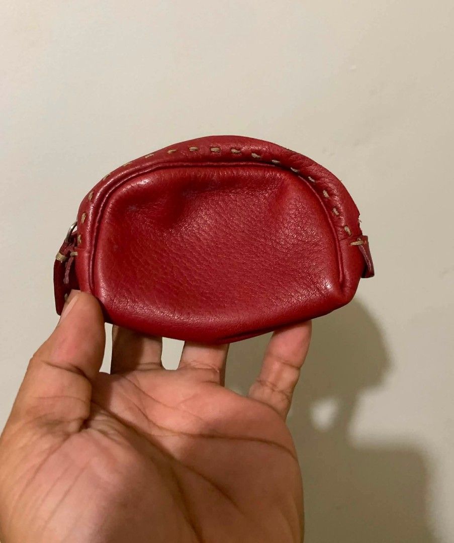 Fendi Red Leather Coin Pouch (Category: Luxury Bags & Wallets) located in Lapu Lapu. Submitted by margaux099 (Listing ID 1454787776, Image 1). Description: - Authentic Fendi coin pouch - Vibrant red leather with stitching detail - Secure zipper closure - Ideal for coins, cards, or small essentials.