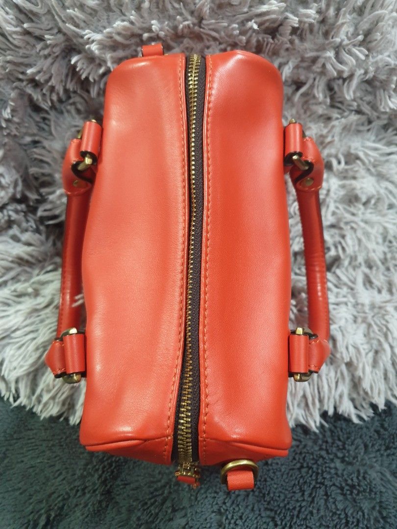 FINO ORANGE LEATHER BAG (Category: Shoulder Bags) located in Manila. Submitted by niknak35503 (Listing ID 1454868363, Image 3). Description: - Orange leather bag with sling - Original Fino bag.