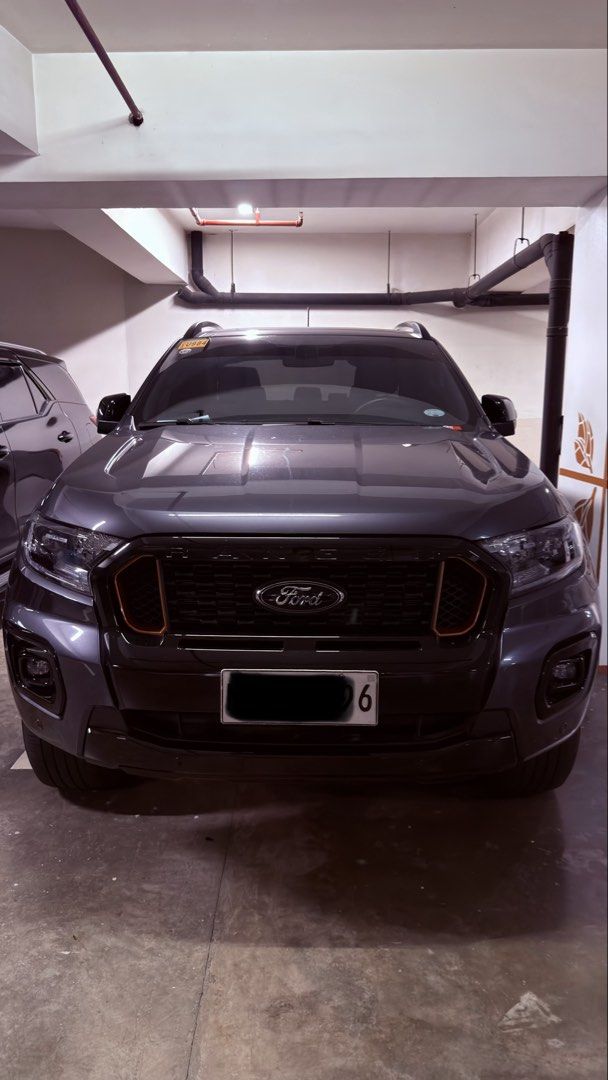 Ford Ranger (Category: Used Cars) located in Taguig. Submitted by r13s. (Listing ID 1454888999, Image 1). Description: Ford Ranger Wildtrak 2022 model Odometer - 37,000 Wednesday coding - plate last digit is 6 Color - Meteor Gray Has scratch and dent on rear wheel driver side No issues.