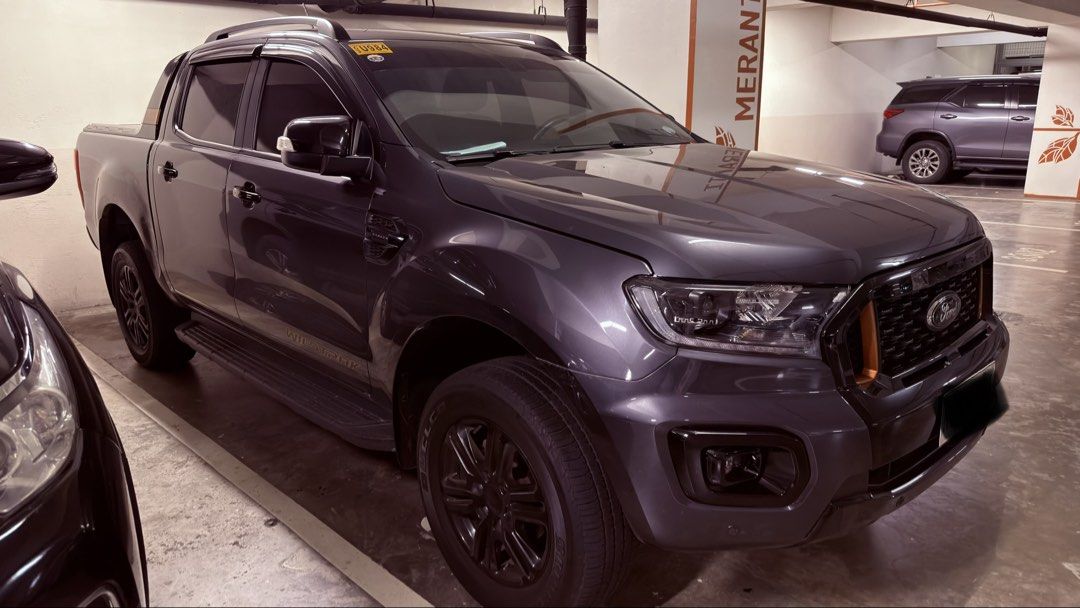 Ford Ranger (Category: Used Cars) located in Taguig. Submitted by r13s. (Listing ID 1454888999, Image 3). Description: Ford Ranger Wildtrak 2022 model Odometer - 37,000 Wednesday coding - plate last digit is 6 Color - Meteor Gray Has scratch and dent on rear wheel driver side No issues.