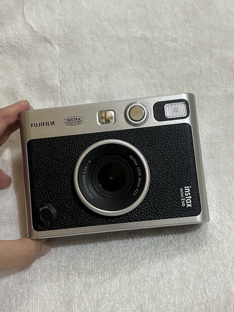 Fujifilm Instax Mini Evo Camera (Category: Cameras) located in Caloocan City. Submitted by yiyilittlethings (Listing ID 1454823396, Image 3). Description: original instax mini evo inclusion: camera orig box case rfs: need funds, barely used price is negotiable.