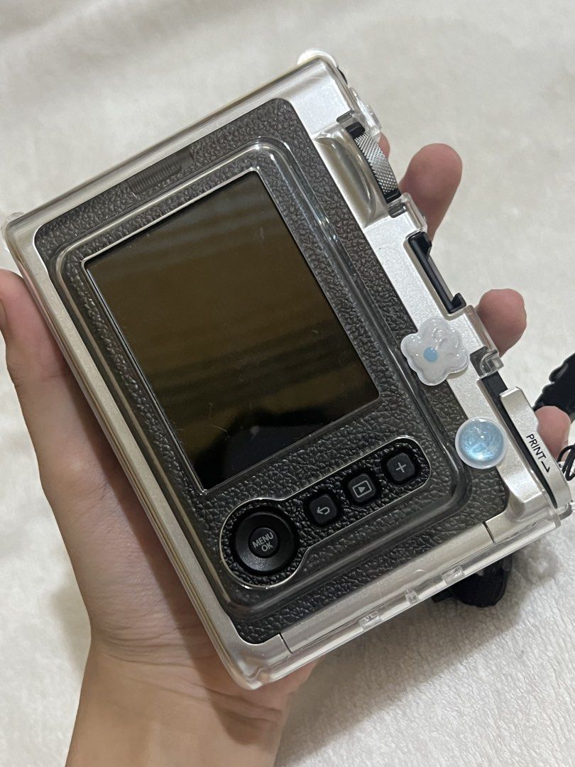 Fujifilm Instax Mini Evo Camera (Category: Cameras) located in Caloocan City. Submitted by yiyilittlethings (Listing ID 1454823396, Image 2). Description: original instax mini evo inclusion: camera orig box case rfs: need funds, barely used price is negotiable.