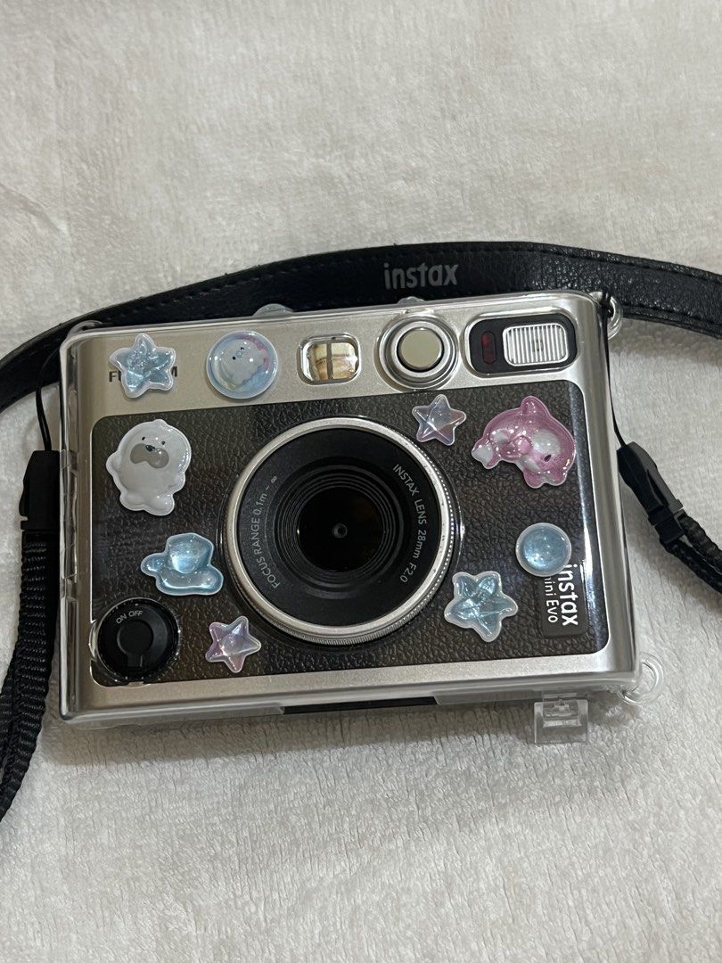 Fujifilm Instax Mini Evo Camera (Category: Cameras) located in Caloocan City. Submitted by yiyilittlethings (Listing ID 1454823396, Image 1). Description: original instax mini evo inclusion: camera orig box case rfs: need funds, barely used price is negotiable.