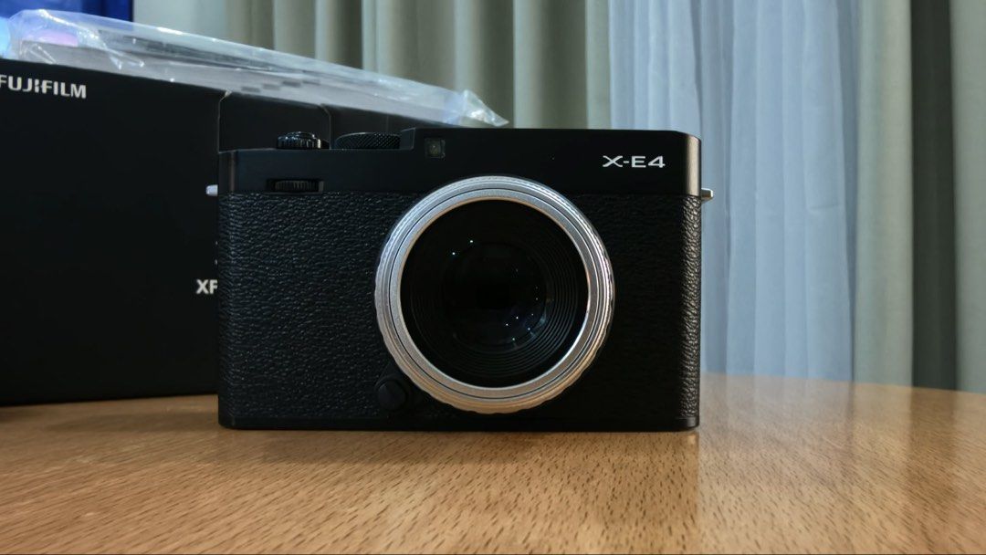 Fujifilm X-E4 (Black) - Body Only (Camera) (Category: Cameras) located in Manila. Submitted by bellepastriesandmore (Listing ID 1454871232, Image 2). Description: Selling my cousins Fujifilm X-E4 Black (Body Only) with freebie # 35mm f/1.6 Manual Mini Toy Lens (great for street photography) and Fujifilm X-E4 Hand Grip for only PHP 52,000. Price is still negotiable. •Pristine condition •Very low shutter count: 1,494 •Tempered glass installed on LC