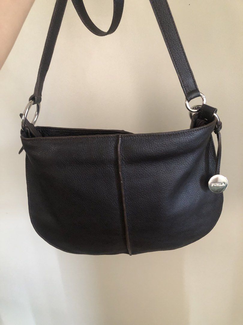Furla crossbody bag black (Category: Luxury Bags & Wallets) located in Pasig City. Submitted by maricrism68145 (Listing ID 1454933545, Image 1). Description: Japan preloved.
