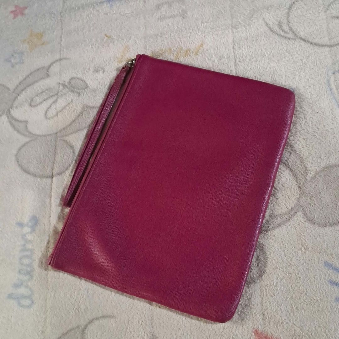Furla Leather Pouch (Category: Luxury Bags & Wallets) located in Pila. Submitted by ester_aurea (Listing ID 1454860574, Image 3). Description: Preloved Gcash payment plus sf No cod - Authentic Furla pouch - Made in Tunisia - 7x9 inches - Deep berry textured leather - Detachable wrist strap - Zipper closure - Ideal for organizing essentials or as a standalone clutch.
