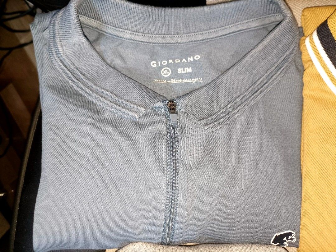 Giordano Polo (Category: Tshirts & Polo Shirts ) located in Quezon City. Submitted by Chess (Listing ID 1454892779, Image 3). Description: Included Items & Sizes: ​Black (Embroidered Patch & Yellow Tipped Collar Polo) – Size XXL (Slim Fit) ​Mustard Yellow (Striped Collar Polo) – Size XXL ​Blue Clay (Quarter-Zip Polo) – Size XL (Slim Fit) ​Heather Grey (Embroidered Crest Polo) – Size Small (Fits like Medium | 19" x 27") ​Royal Blue (Embroidered Cr