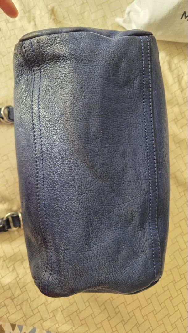 Givenchy Navy Blue Leather Nightingale Bag (Category: Luxury Bags & Wallets) located in Quezon City. Submitted by louab20 (Listing ID 1454871925, Image 3). Description: - Authentic Navy Blue Givenchy Nightingale Bag - Genuine Leather - Zippers are in excellent working condition - Classic and timeless design - Spacious interior, ideal for everyday essentials.