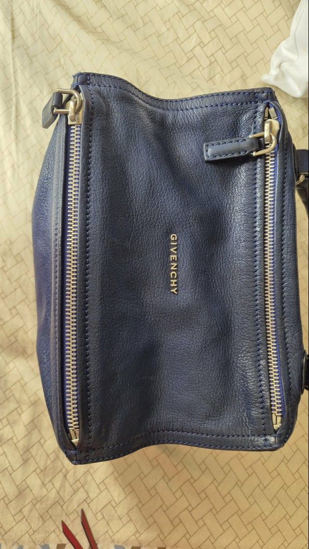 Givenchy Navy Blue Leather Nightingale Bag (Category: Luxury Bags & Wallets) located in Quezon City. Submitted by louab20 (Listing ID 1454871925, Image 1). Description: - Authentic Navy Blue Givenchy Nightingale Bag - Genuine Leather - Zippers are in excellent working condition - Classic and timeless design - Spacious interior, ideal for everyday essentials.